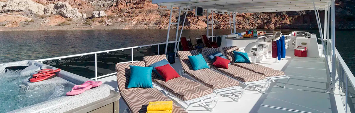 Houseboat top deck with chaise lounge chairs