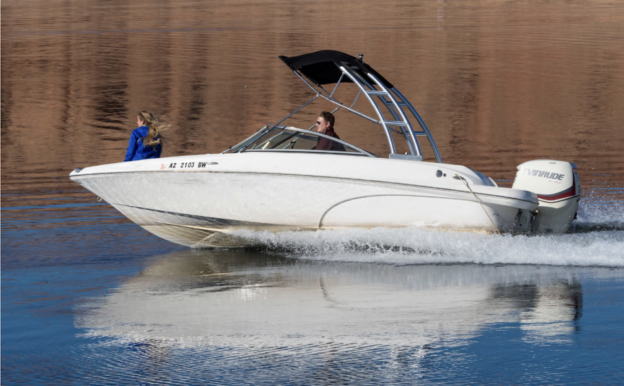 A speed boat gliding across Lake Mead